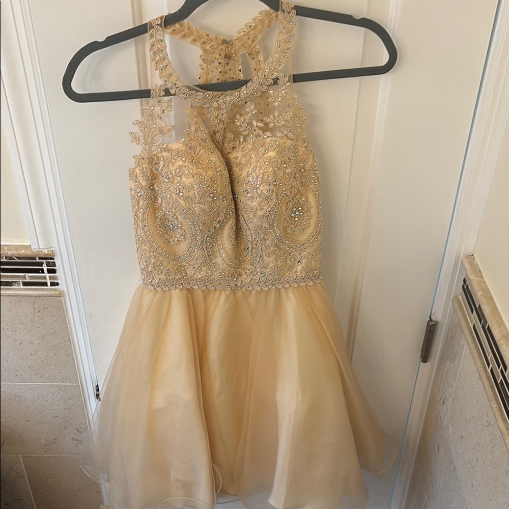 Gold sleeveless halter fit and flare maxi dress for prom